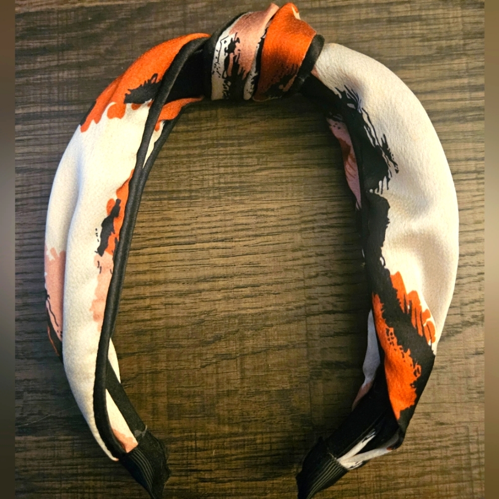 Cream Knot Headband with Orange Rust colored spots & navy outline